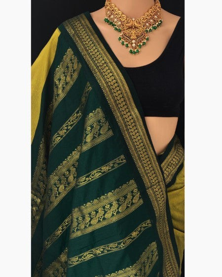 PEAR GREEN COTTON SILK SAREE WITH GREEN BORDER.