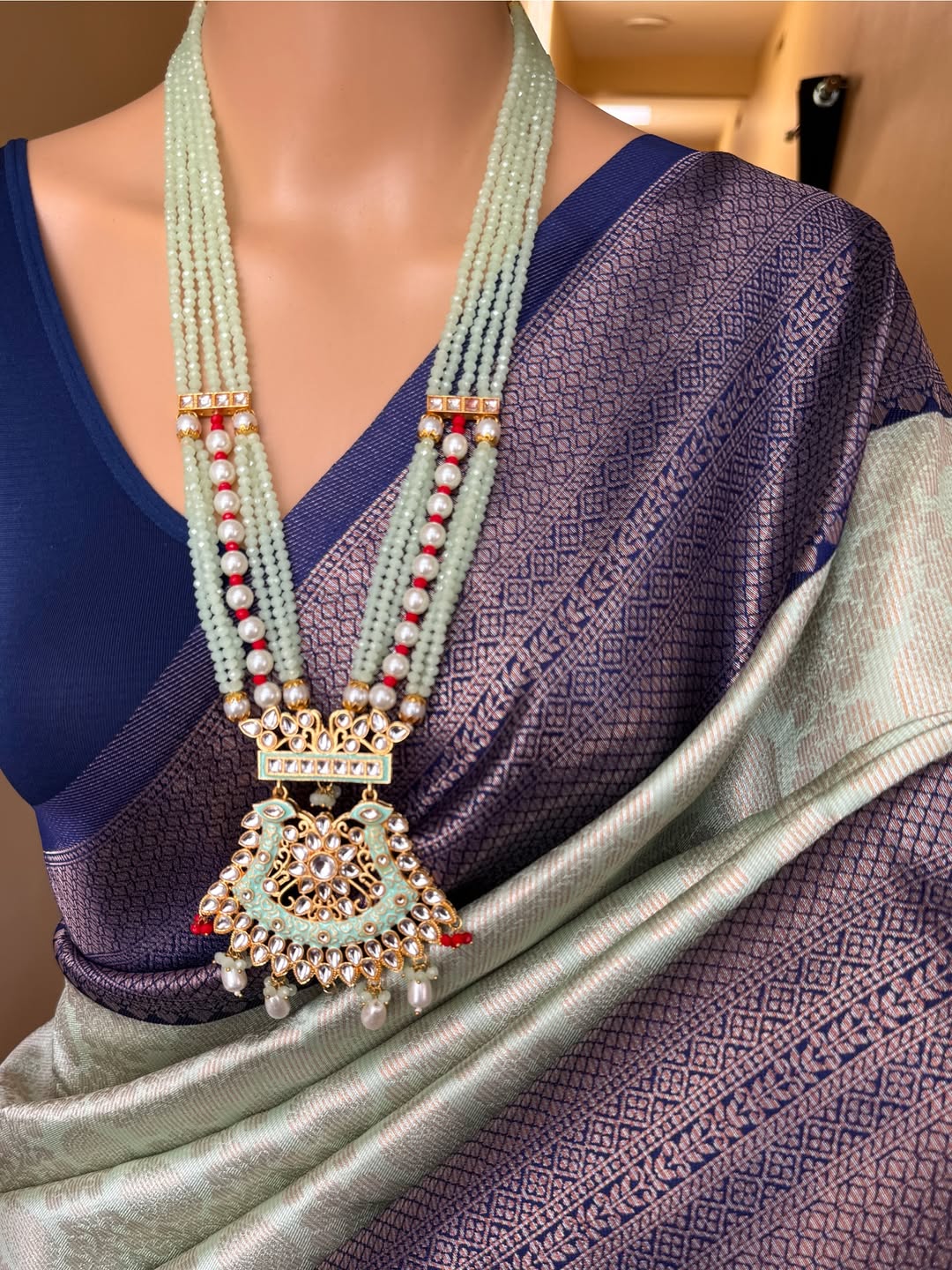 PISTA GREEN ART SILK SAREE WITH COPPER SILVER BORDER