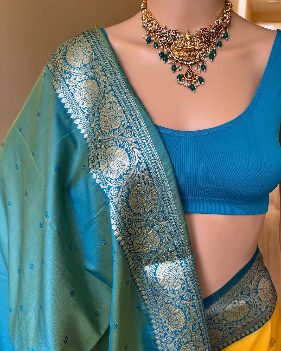 YELLOW ART SILK SAREE WITH SKY BLUE BORDER