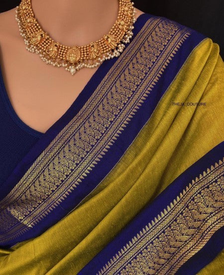 PEAR GREEN COTTON SILK SAREE WITH BLUE BORDER.
