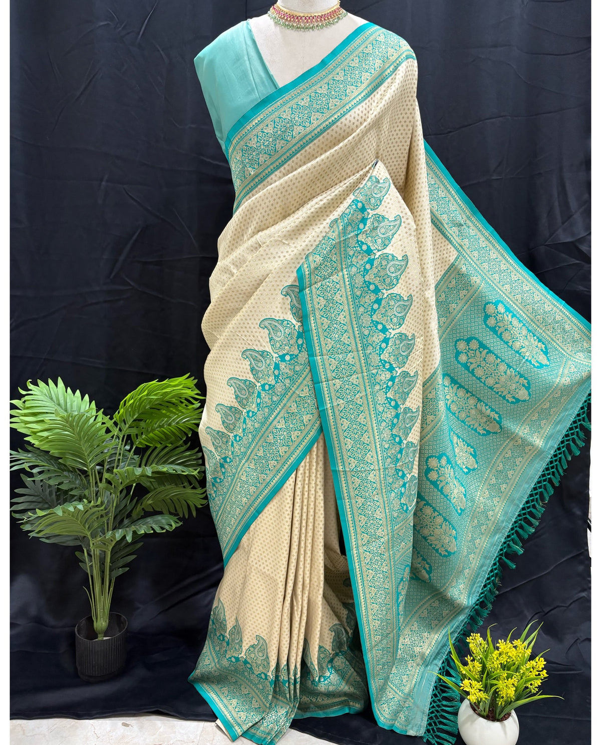 Ivory white brocade silk saree with teal blue border