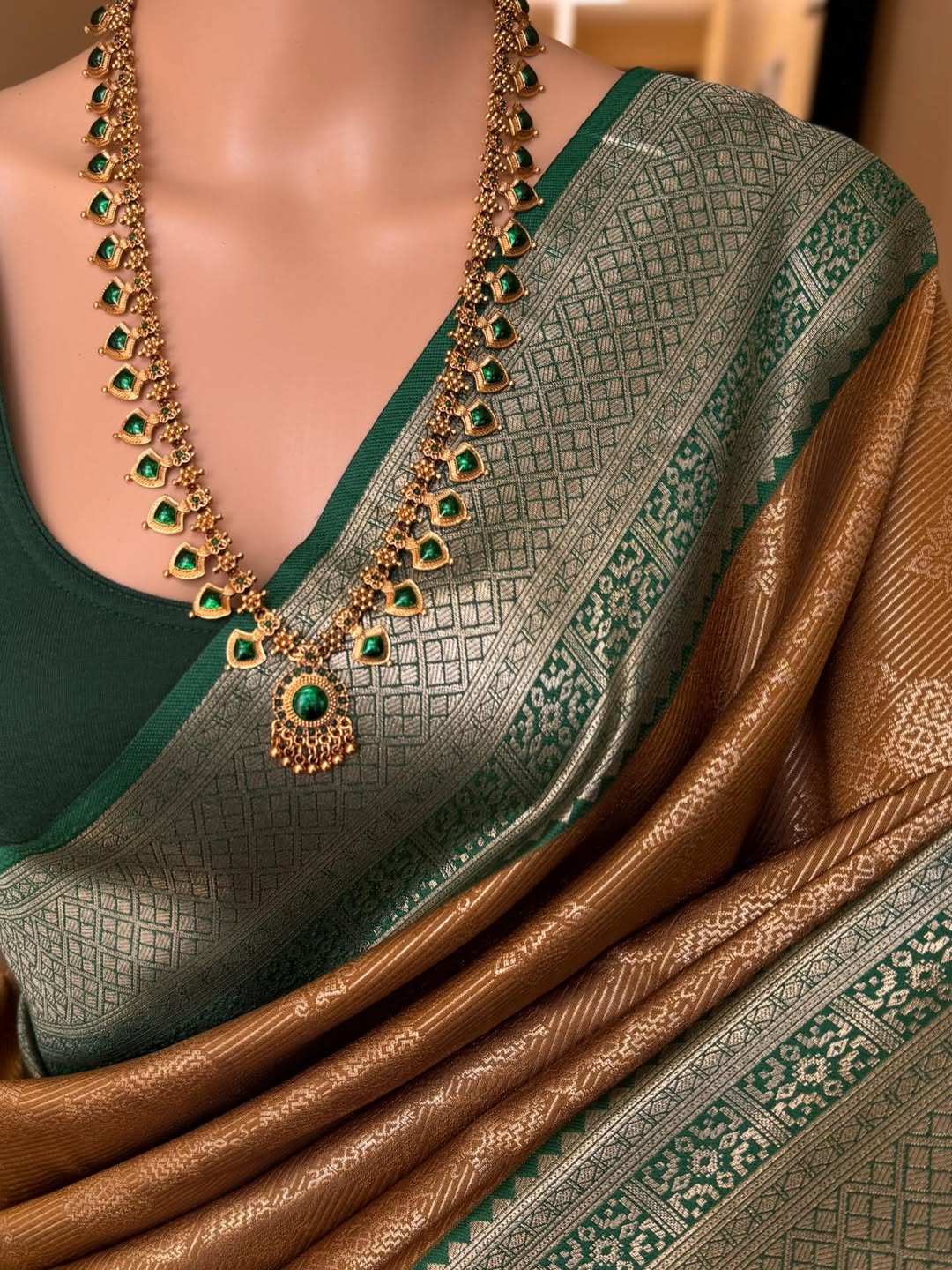 MUSTARD ART SILK SAREE WITH CONTRAST BOTTLE GREEN ZARI BORDER