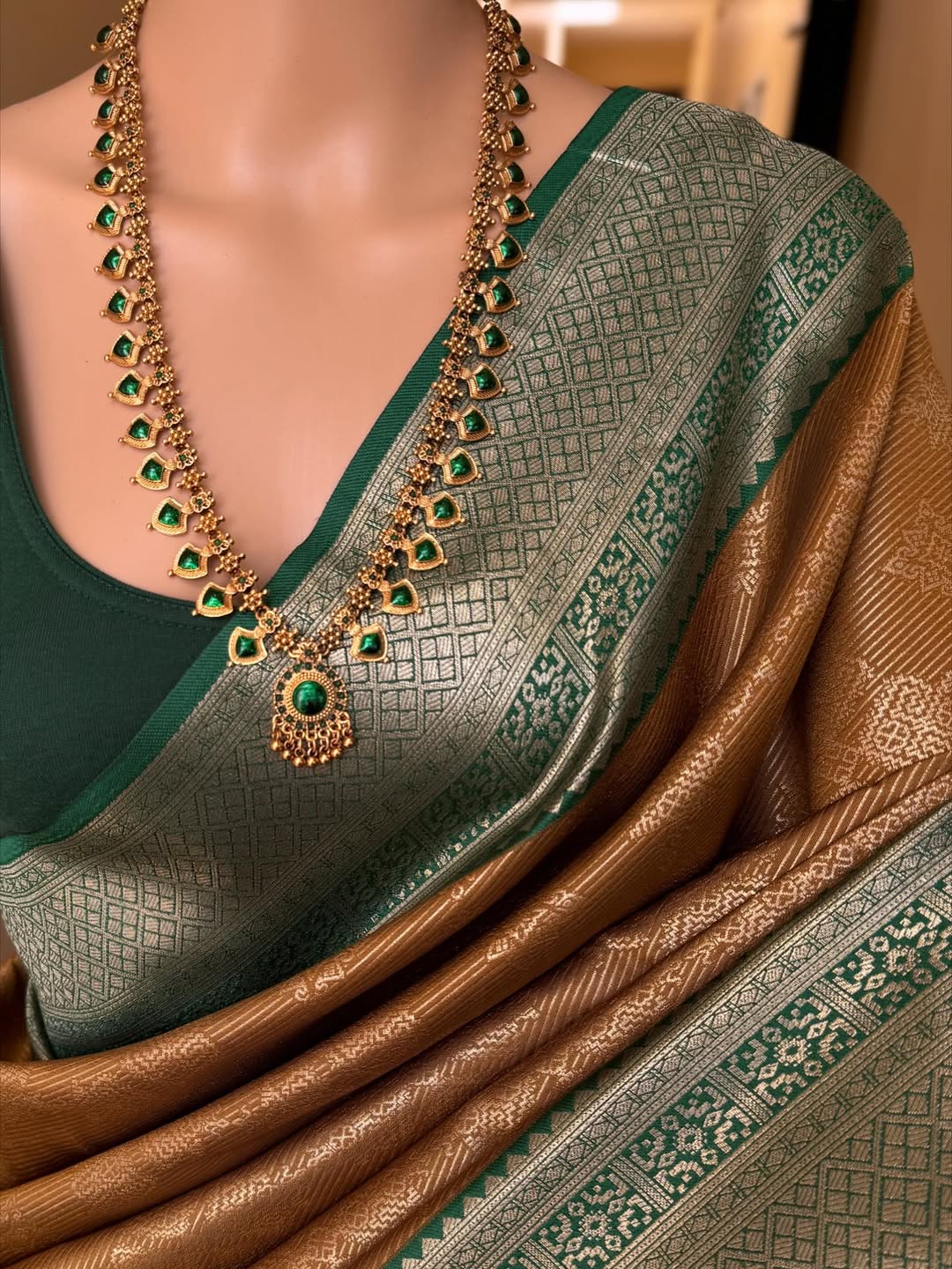 MUSTARD ART SILK SAREE WITH CONTRAST BOTTLE GREEN ZARI BORDER