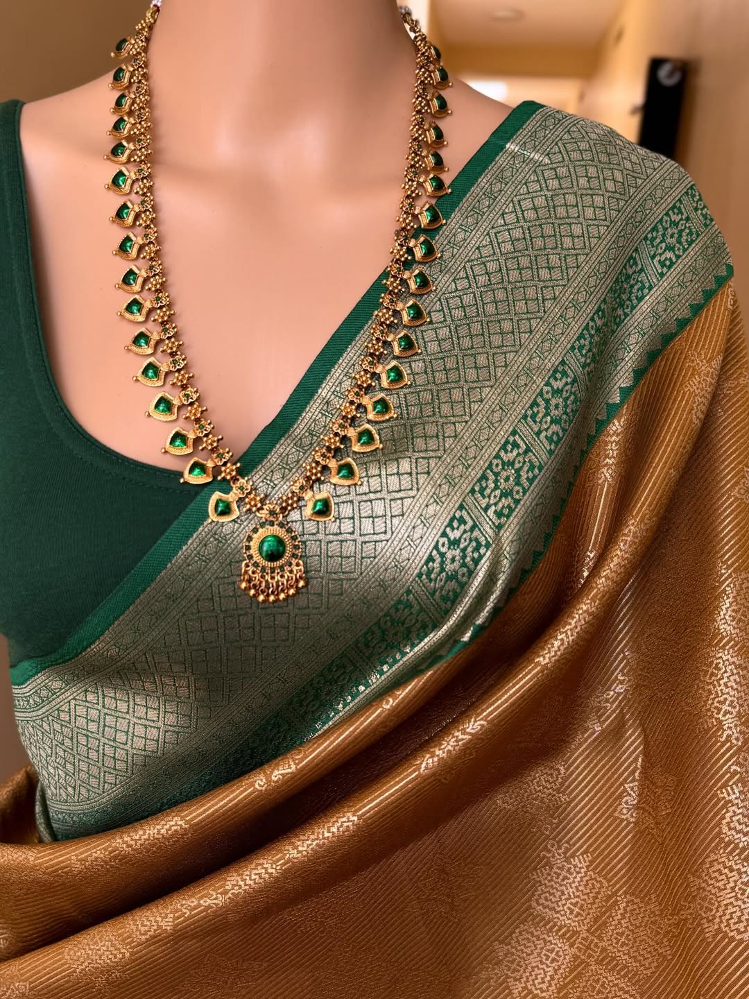 MUSTARD ART SILK SAREE WITH CONTRAST BOTTLE GREEN ZARI BORDER