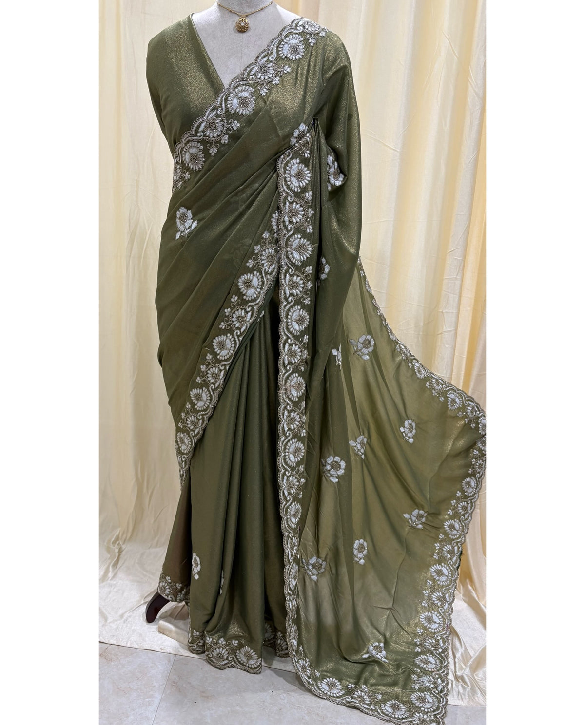 Olive green georgette saree with white embroidery saree.