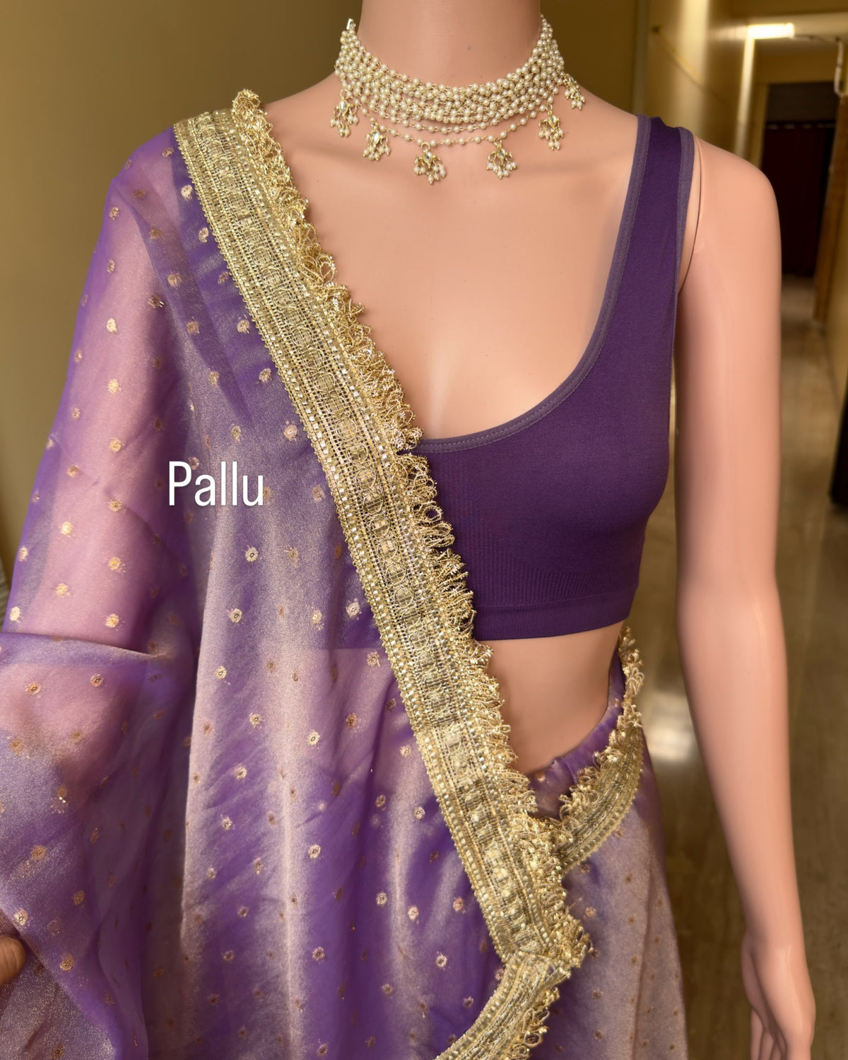 Lavender gold dual shaded tissue chiffon saree with jhula lace and buttas over saree.