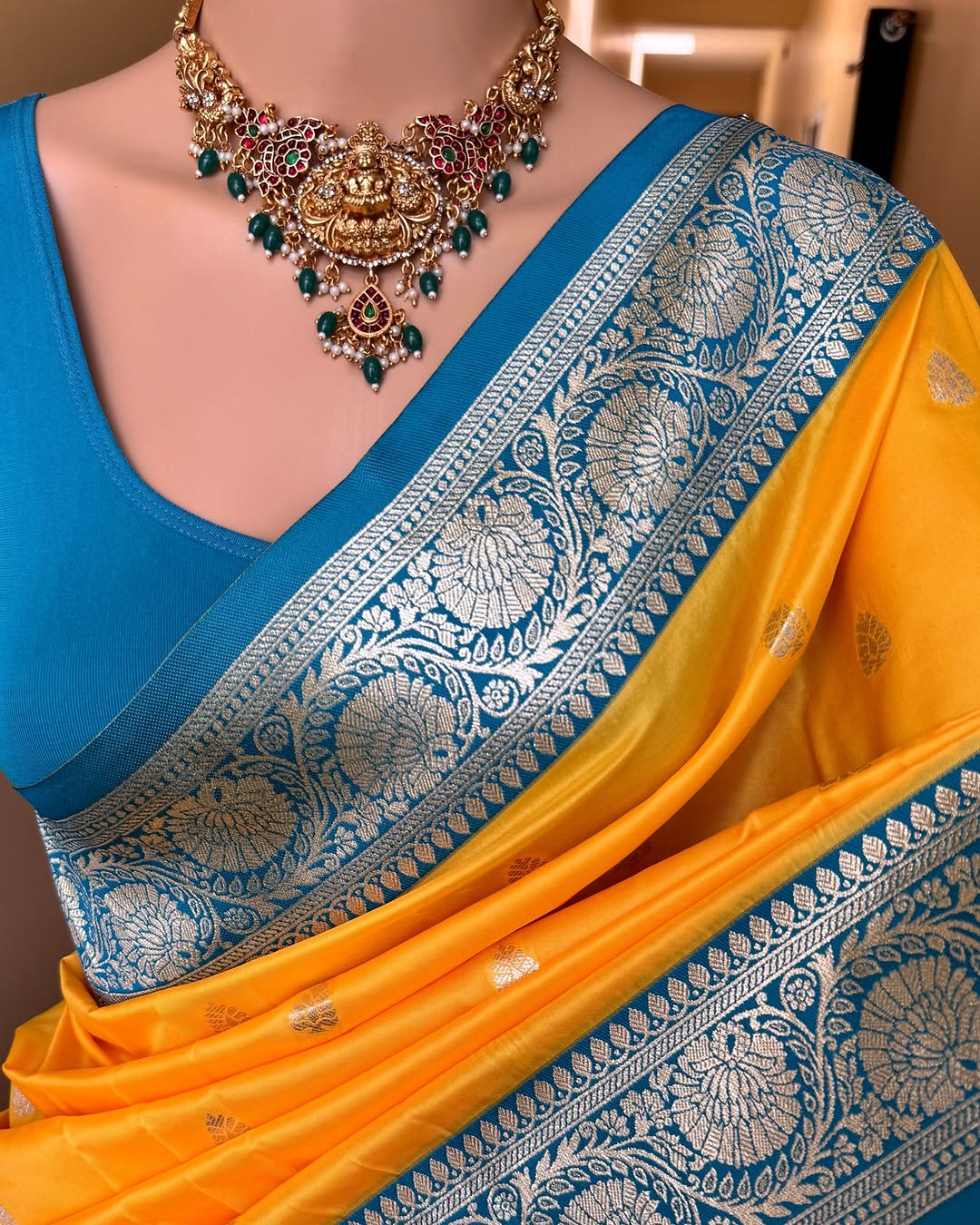 YELLOW ART SILK SAREE WITH SKY BLUE BORDER