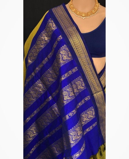 PEAR GREEN COTTON SILK SAREE WITH BLUE BORDER.
