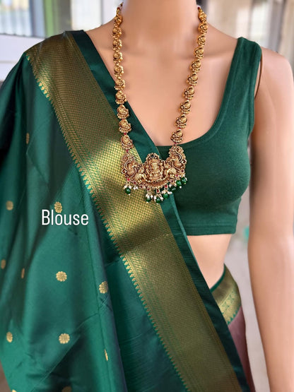 SAND BROWN ART SILK COMES WITH BOTTLE GREEN GOLDEN ZARI WEAVE BORDER