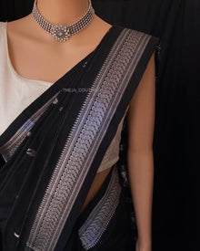 BLACK SILK COTTON SAREE WITH SILVER BORDER.