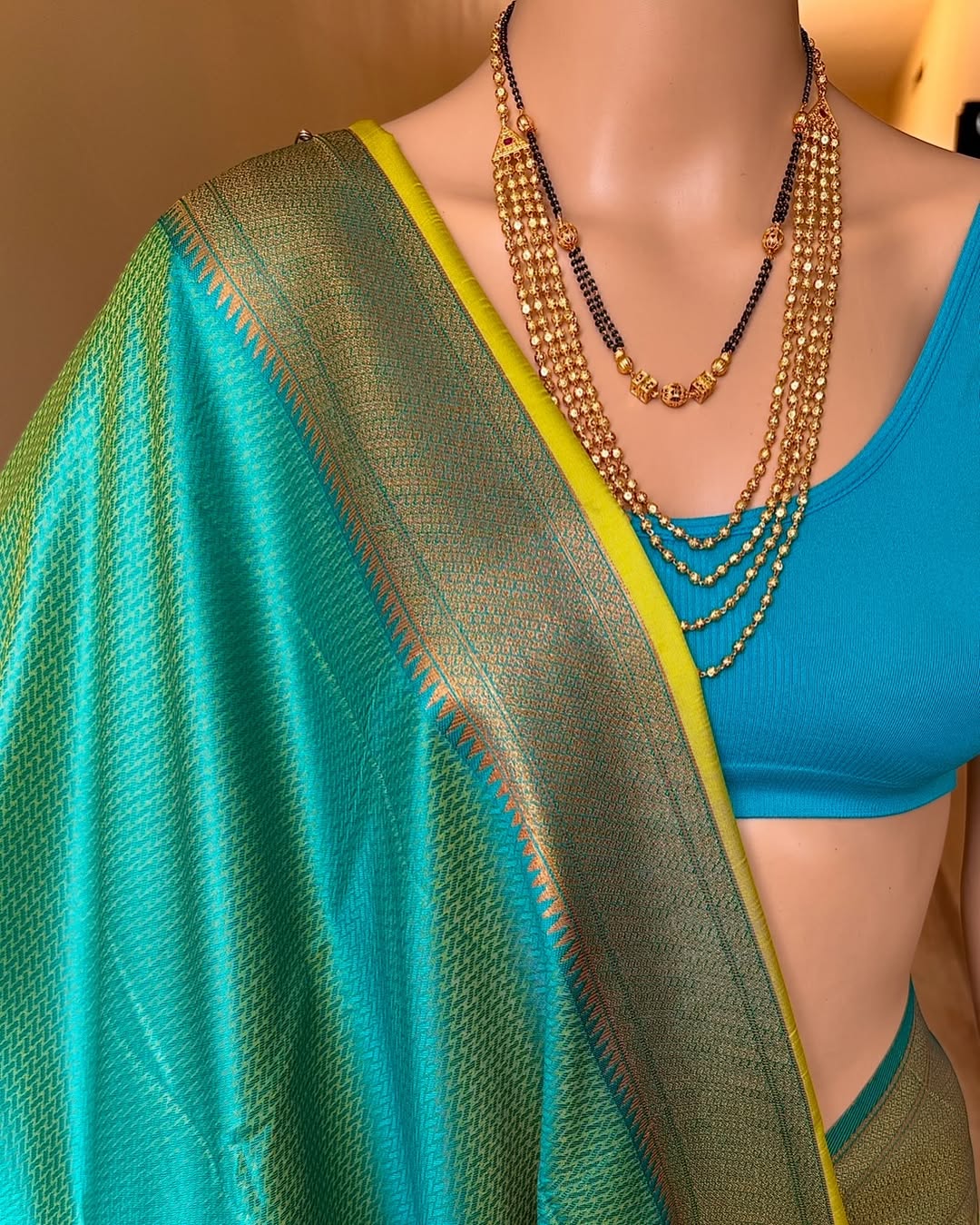 PEAR GREEN CHANDRAKOR ART SILK SAREE WITH TEAL BLUE BORDER