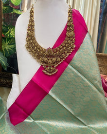 TURQUOISE GREEN TISSUE SAREE