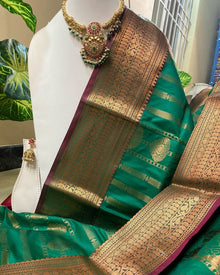 GREEN ART SILK SAREE WITH PINK BORDER