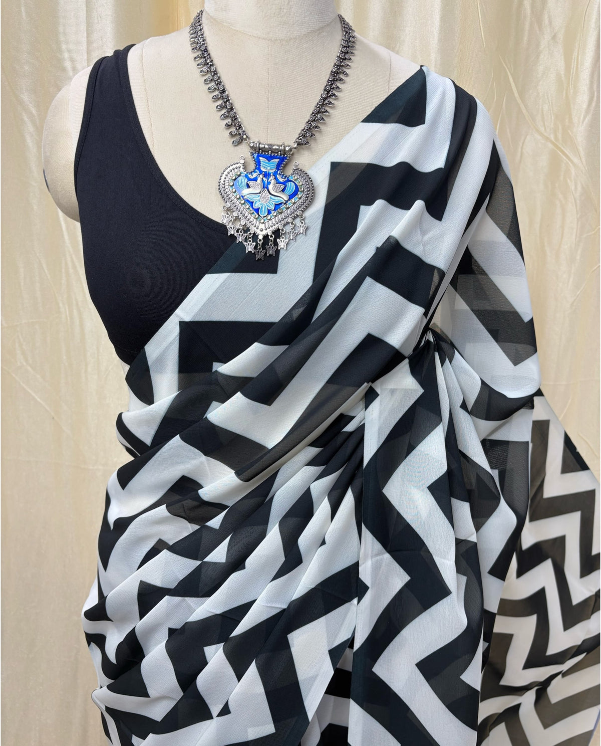 Black and white zigzag georgette saree.