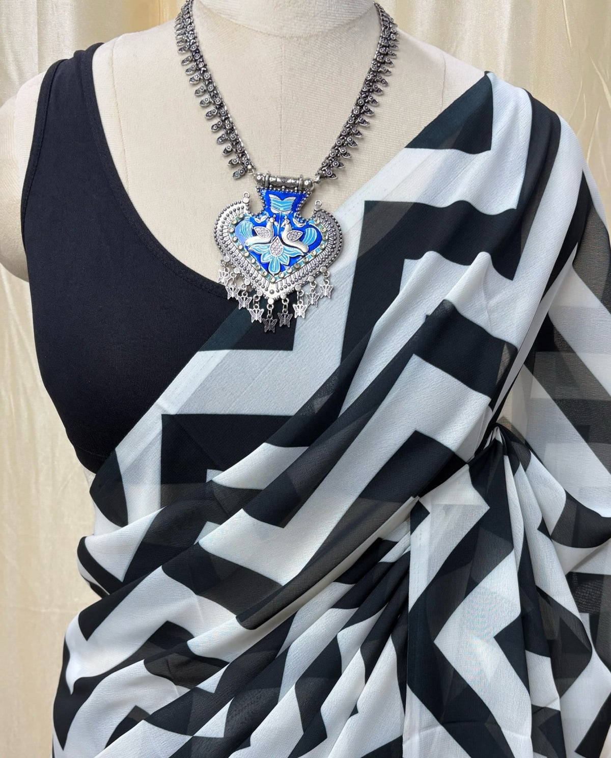 Black and white zigzag georgette saree.