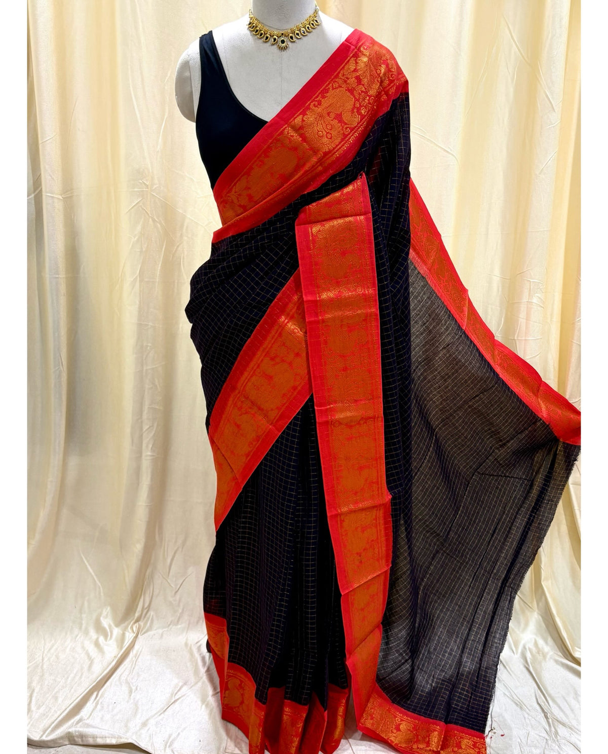 Black kattam sungudi cotton sarees with red orange border.