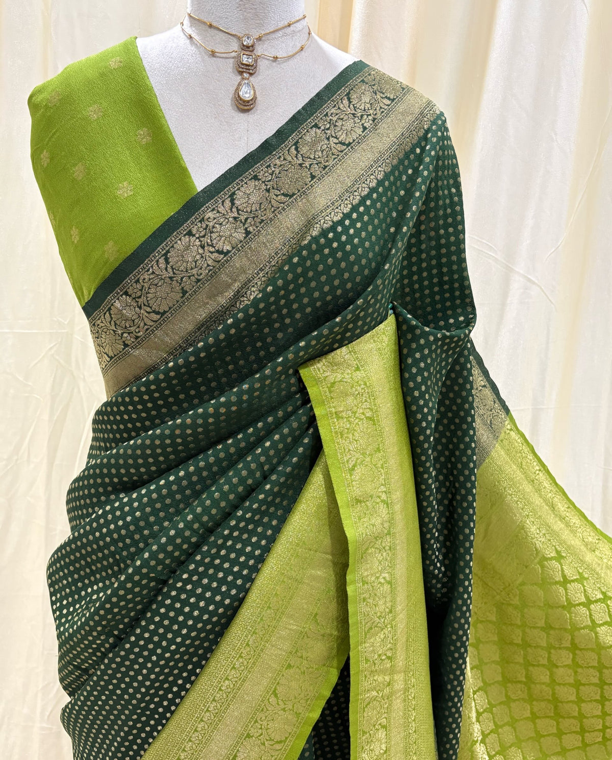 Bottle green chiffon saree with pista green border