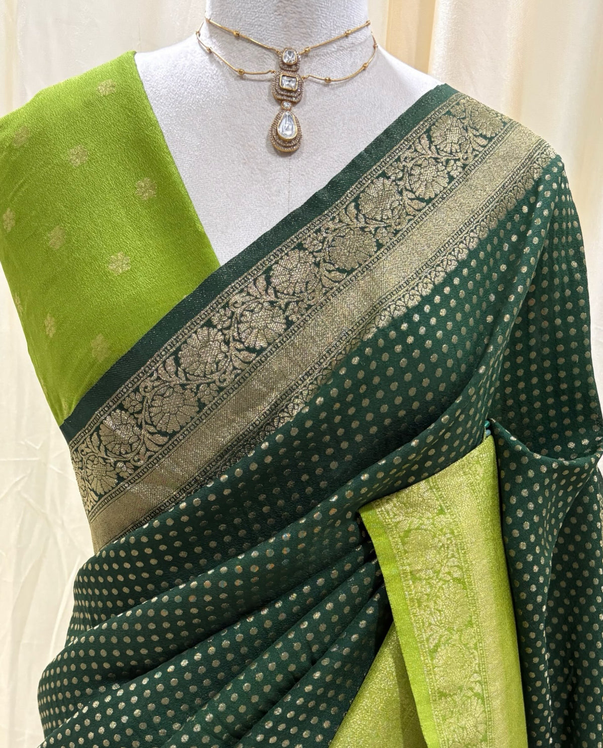 Bottle green chiffon saree with pista green border
