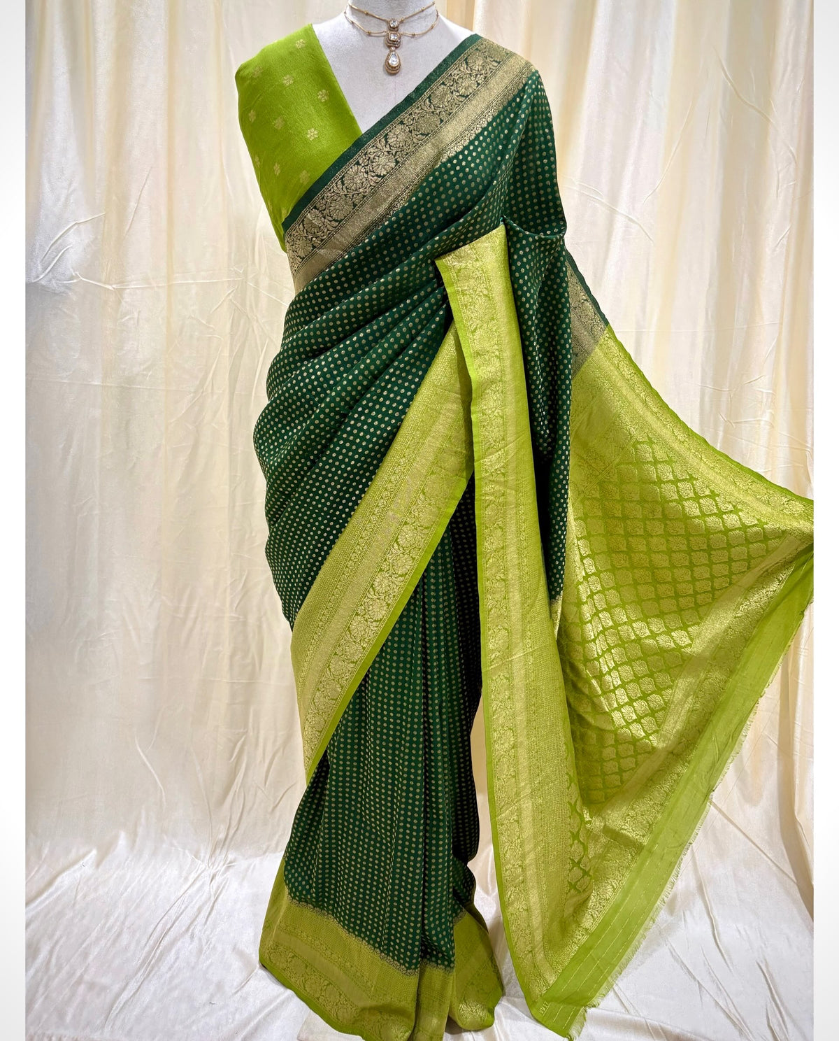 Bottle green chiffon saree with pista green border