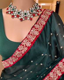 BOTTLE GREEN SATIN GEORGETTE SAREE WITH GOLDEN LACE