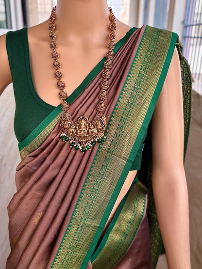 SAND BROWN ART SILK COMES WITH BOTTLE GREEN GOLDEN ZARI WEAVE BORDER