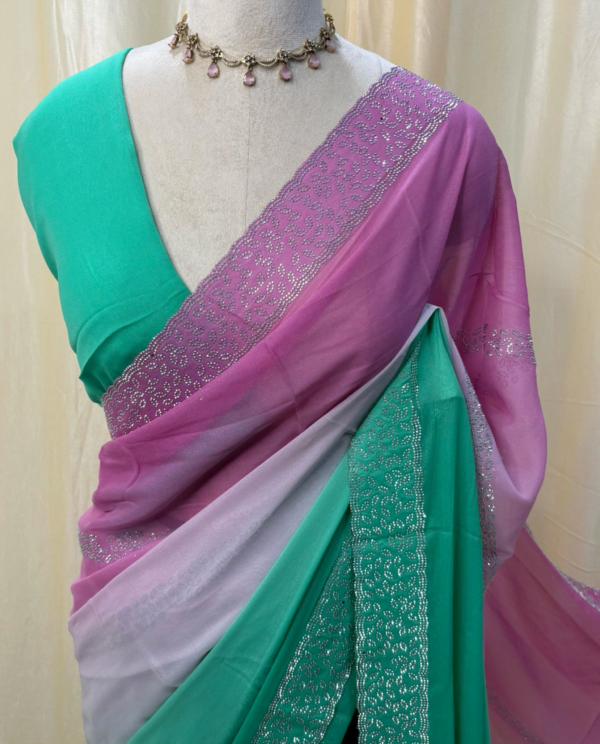 Lavender green half and half georgette saree.