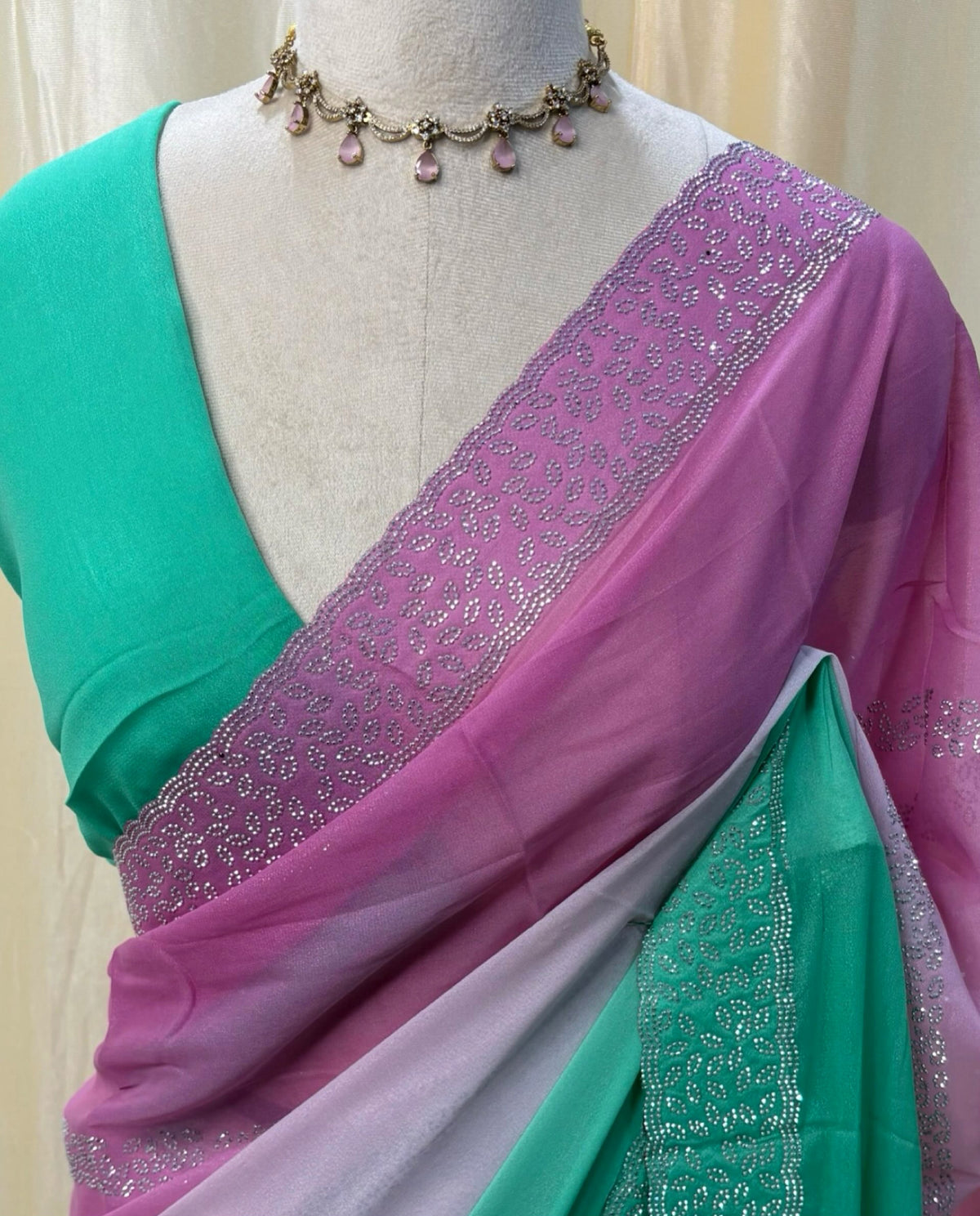 Lavender green half and half georgette saree.