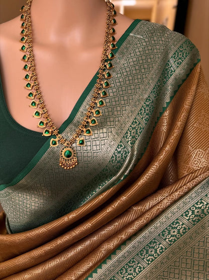 MUSTARD ART SILK SAREE WITH CONTRAST BOTTLE GREEN ZARI BORDER