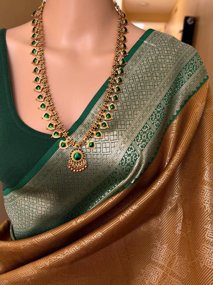 MUSTARD ART SILK SAREE WITH CONTRAST BOTTLE GREEN ZARI BORDER