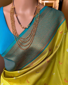 PEAR GREEN CHANDRAKOR ART SILK SAREE WITH TEAL BLUE BORDER