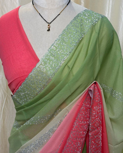 Pista green and pink half and half georgette saree.