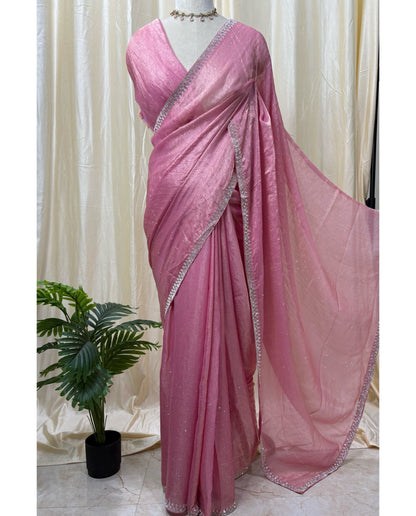 Rose pink georgette saree with white saree.