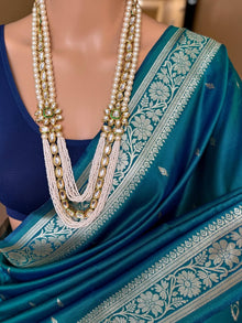 PEACOCK GREEN SOFT SILK SAREE WITH GOLDEN ZARI WEAVE BORDER