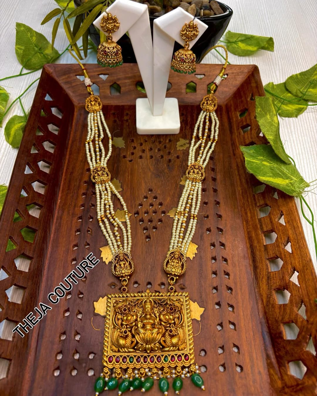 Ivory 5 layered beads long harram with lakshmi dollar
