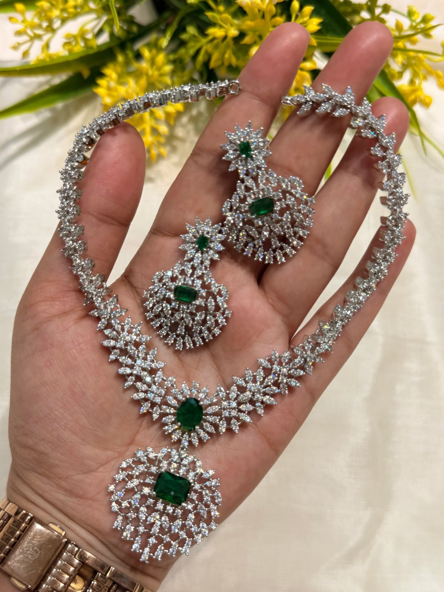 Silver stone necklace with greenstone comes with earrings.
