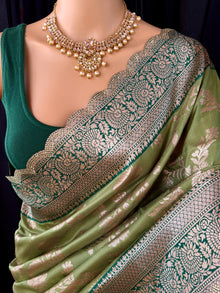 Mehendi green semi art silk saree.