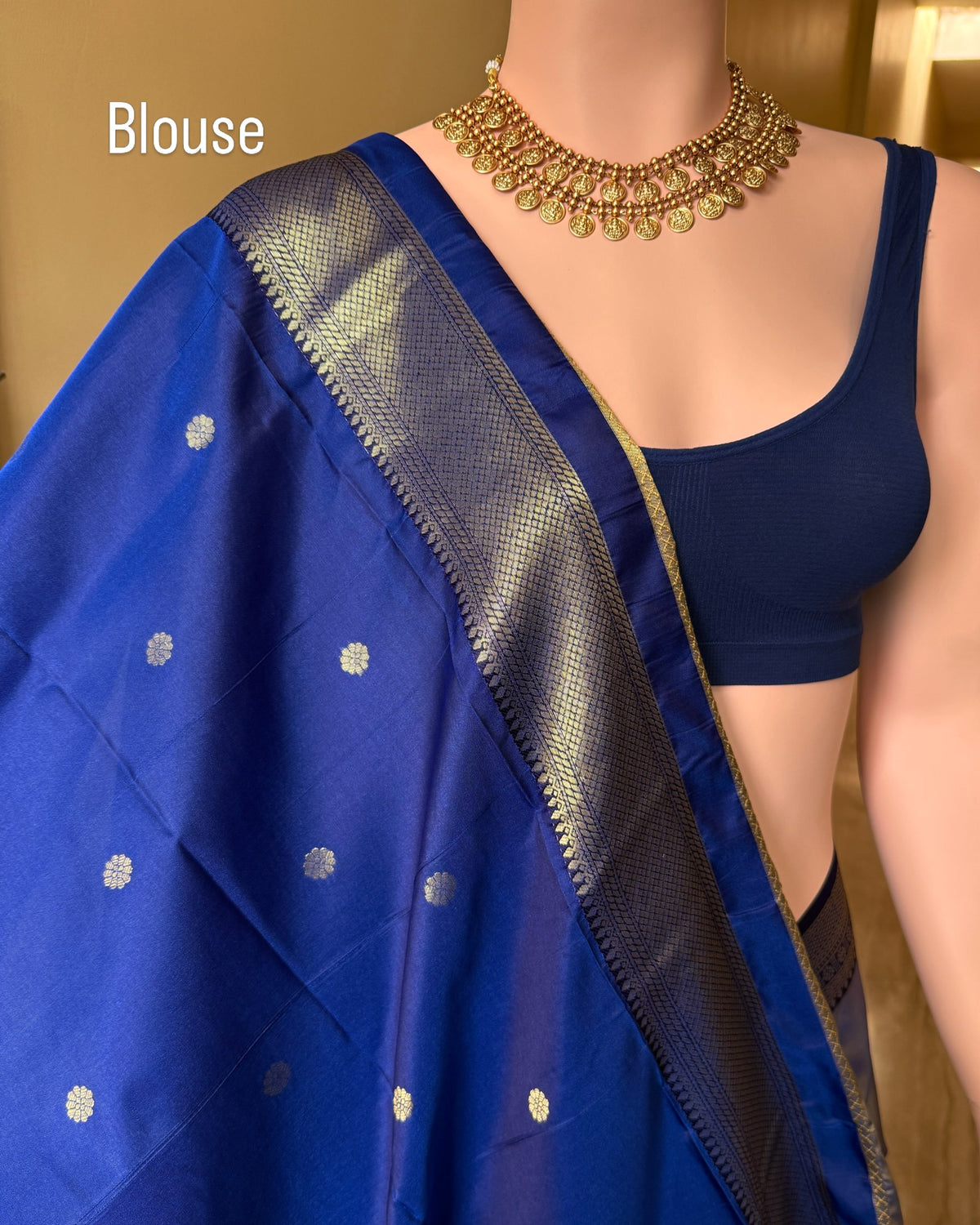 Ice blue art silk saree with navy blue border