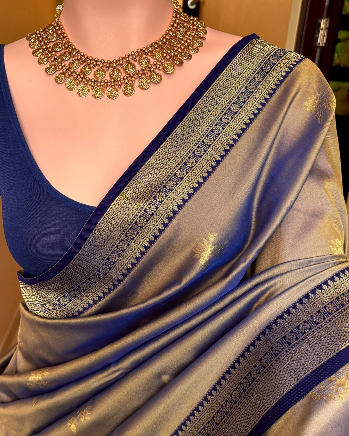 Ice blue art silk saree with navy blue border