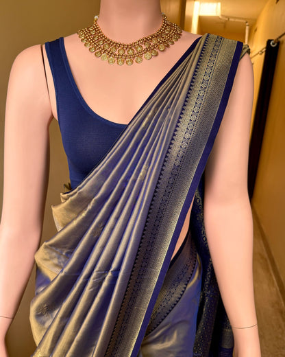 Ice blue art silk saree with navy blue border