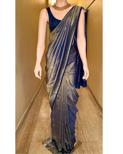 Ice blue art silk saree with navy blue border