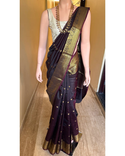 DARK WINE BLACK ART SILK SAREE WITH GOLDEN ZARI BORDER.