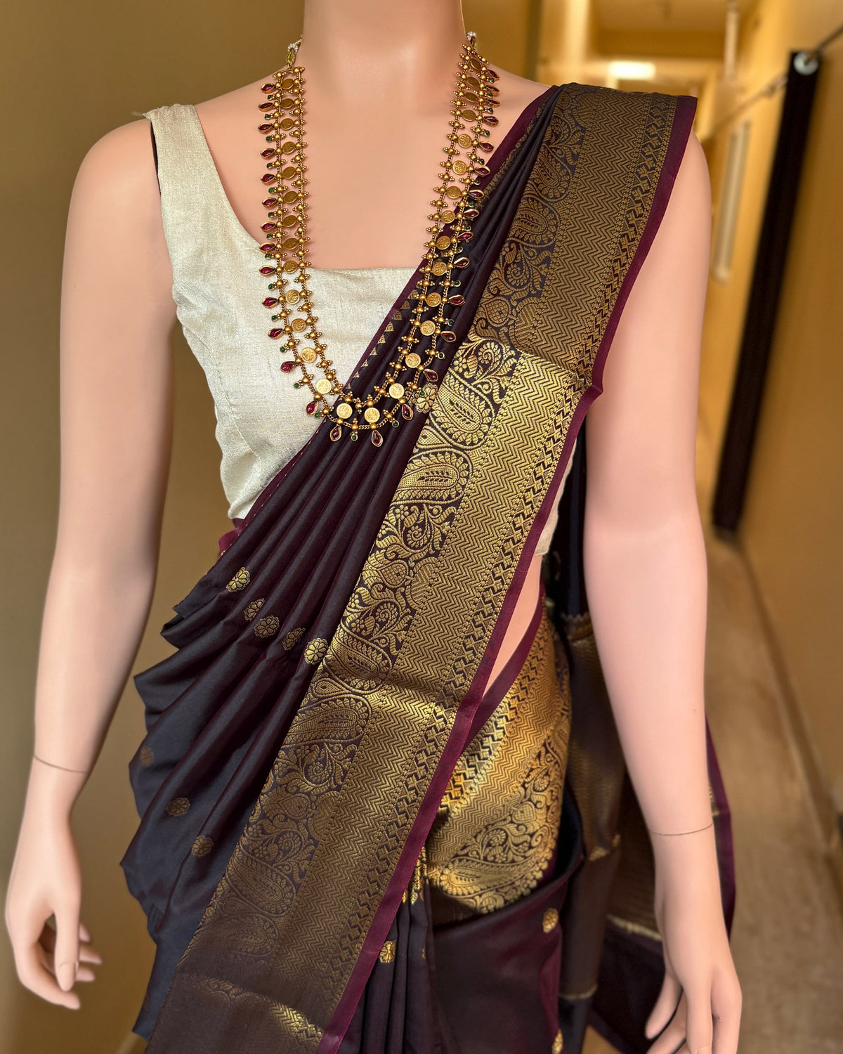 DARK WINE BLACK ART SILK SAREE WITH GOLDEN ZARI BORDER.