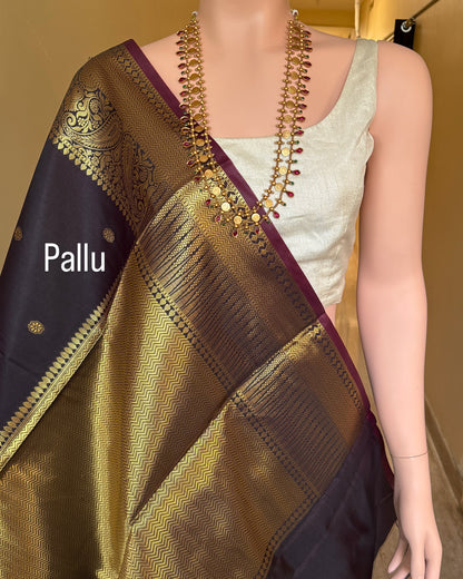 DARK WINE BLACK ART SILK SAREE WITH GOLDEN ZARI BORDER.