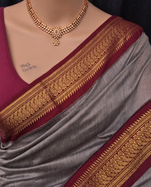 ASH COTTON SILK SAREE WITH PEACOCK BORDER.