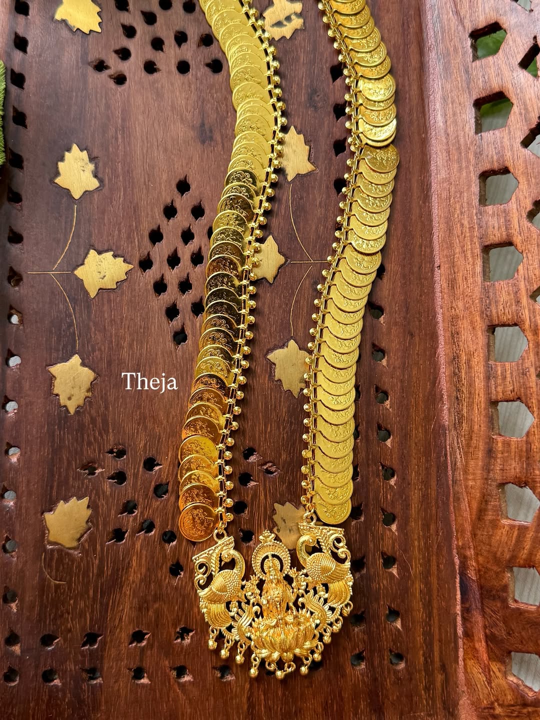 Lakshmi antique coin chain with dollar.