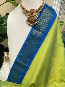 PASTEL GREEN TRADITIONAL COTTON SILK SAREE WITH TEAL BLUE BORDER