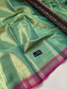 TURQUOISE GREEN SOFT TISSUE SAREE COMES WITH PINK BORDER