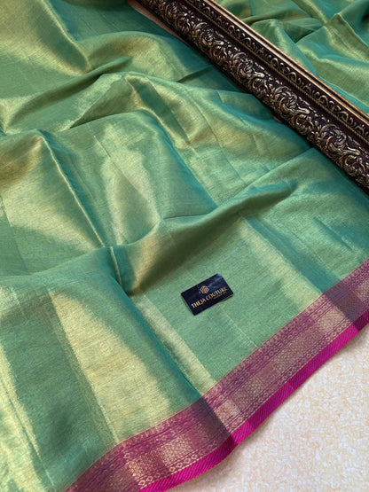TURQUOISE GREEN SOFT TISSUE SAREE COMES WITH PINK BORDER