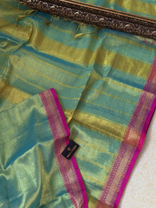 TURQUOISE BLUE SOFT TISSUE SAREE COMES WITH PINK BORDER
