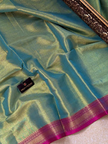 TURQUOISE BLUE SOFT TISSUE SAREE COMES WITH PINK BORDER